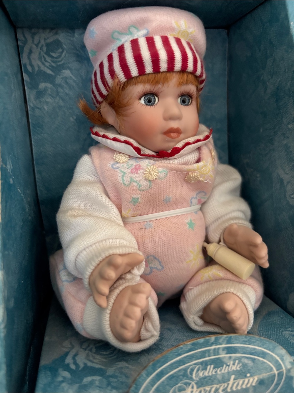 Collectible Porcelain Baby Doll in Pink Outfit - Picture 2 of 5